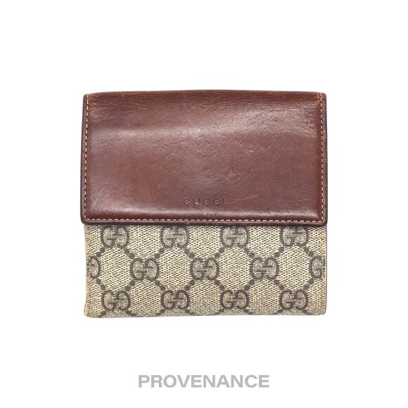Gucci Handbags - 🔴 Gucci Trifold Snap Wallet - GG Supreme Brown